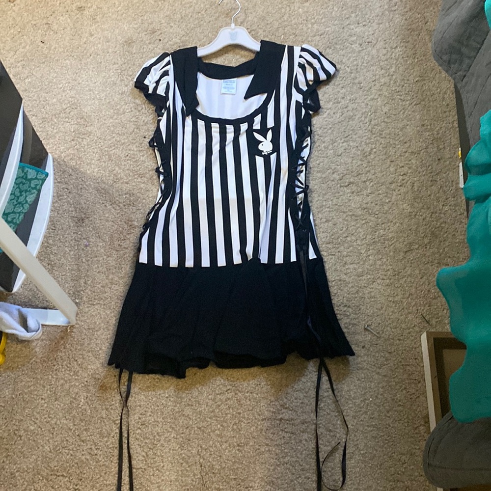 A Halloween costume girl referee romper